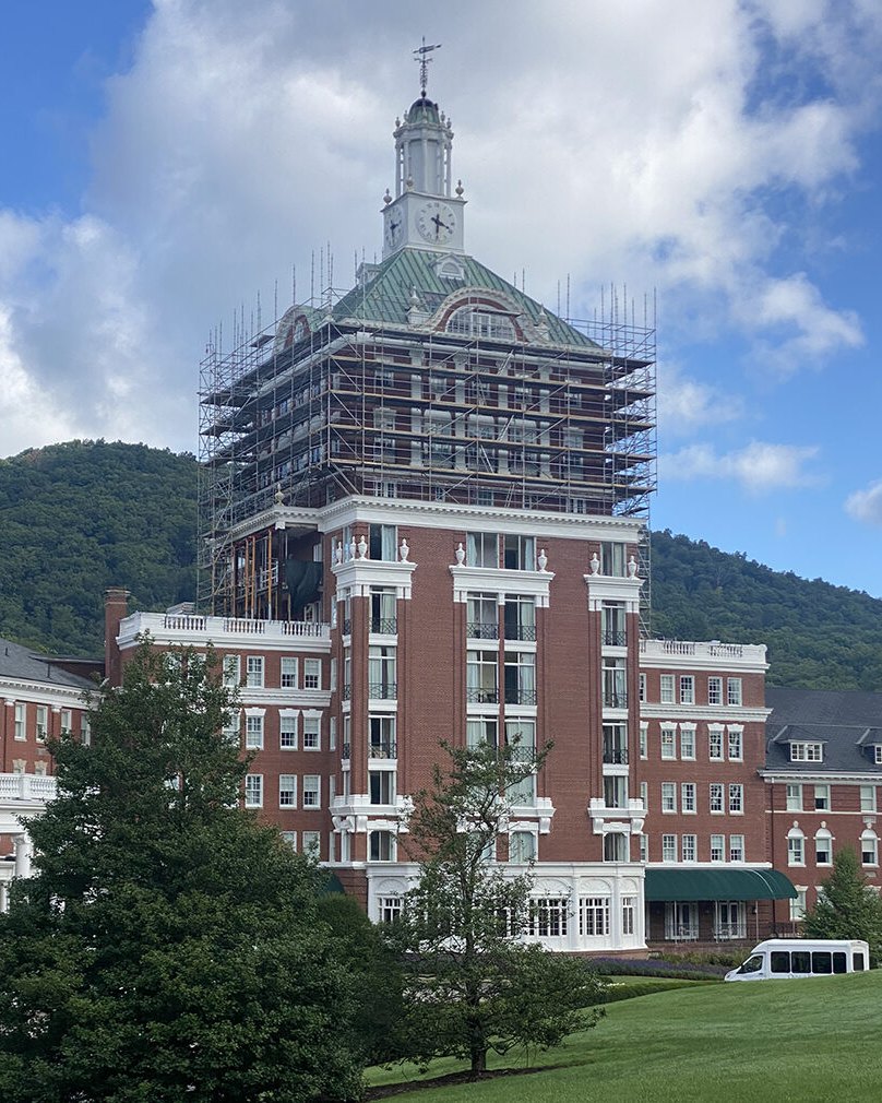 Scaffolding around a historic roof under repair